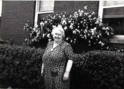 Grandmother by garden
